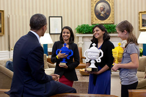President Barack Obama congratulates Google Science Fair winners, from left, Naomi Shah, Shree Bose, and Lauren Hodge in the Oval Office, Oct. 3, 2011. (Official White House Photo by Pete Souza)

This official White House photograph is being made available only for publication by news organizations and/or for personal use printing by the subject(s) of the photograph. The photograph may not be manipulated in any way and may not be used in commercial or political materials, advertisements, emails, products, promotions that in any way suggests approval or endorsement of the President, the First Family, or the White House.Ê